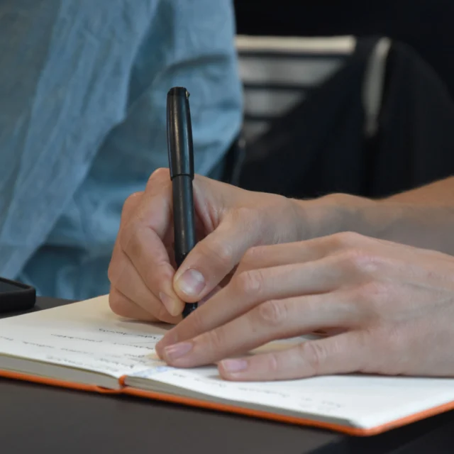 Participant taking notes during ENDURANCE workshop